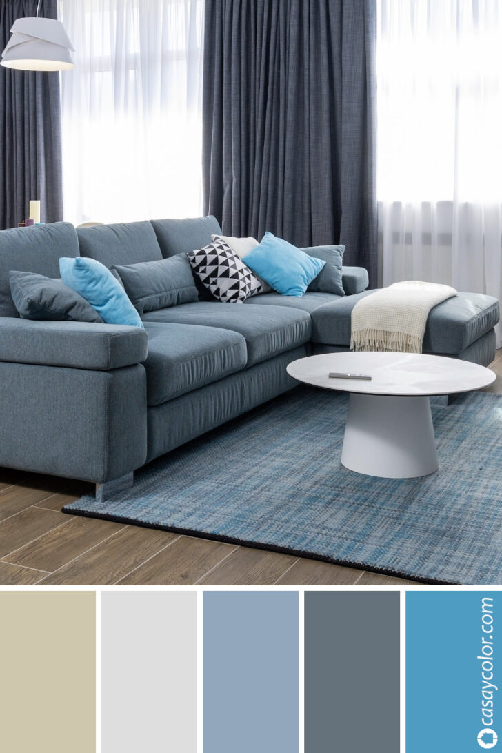 Sala en tonos grises en combinación con azul celeste