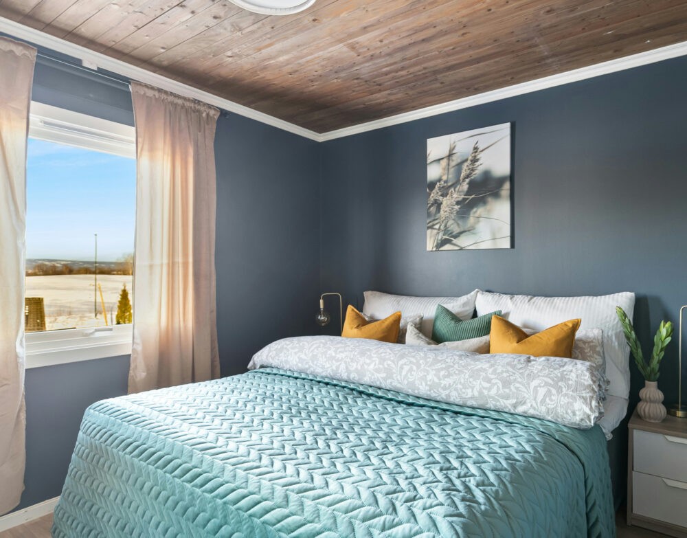 Dormitorio de pareje en tonos azules